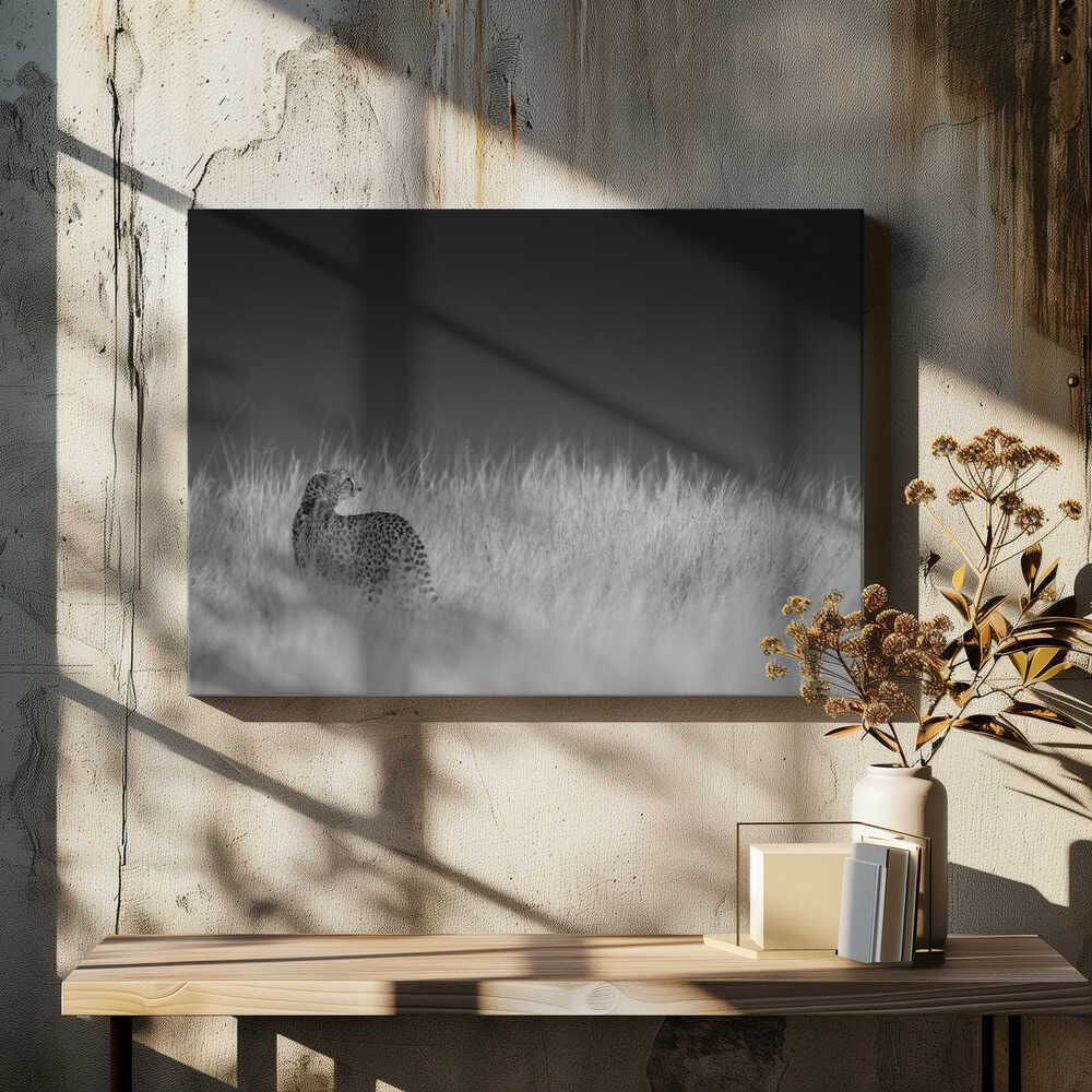 Portrait of a cheetah standing on grassy field