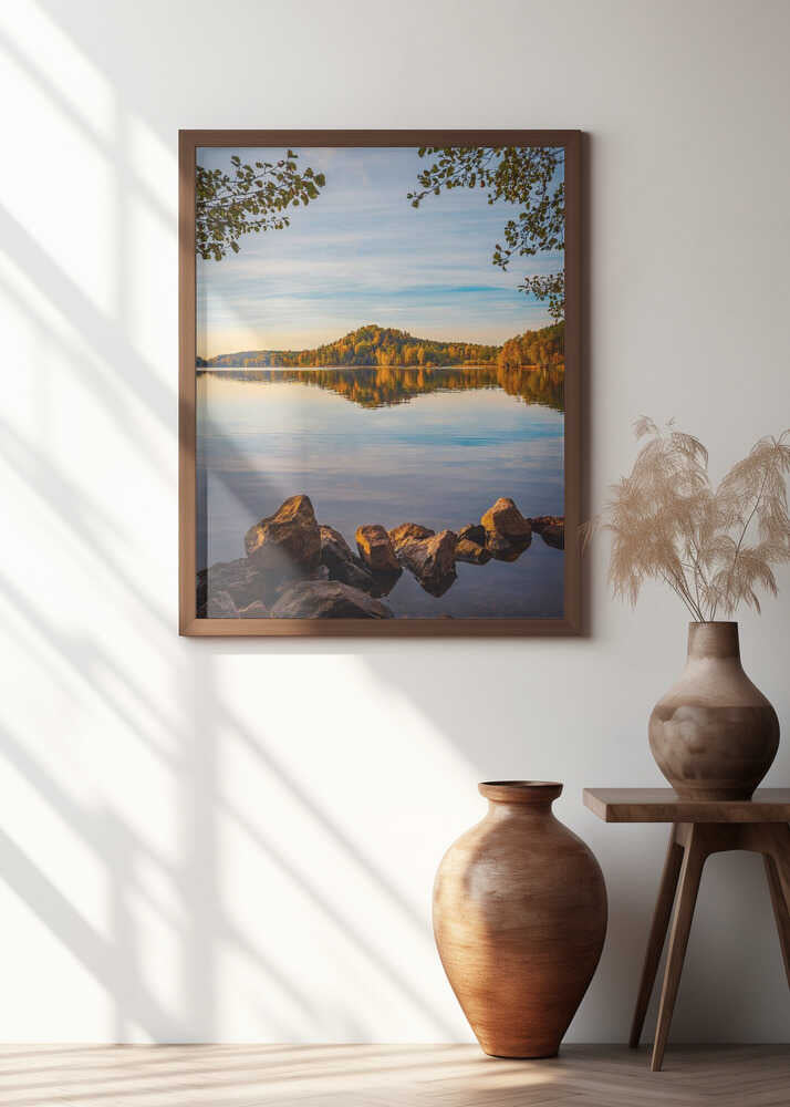 Autumn lake with a small mountain in the background