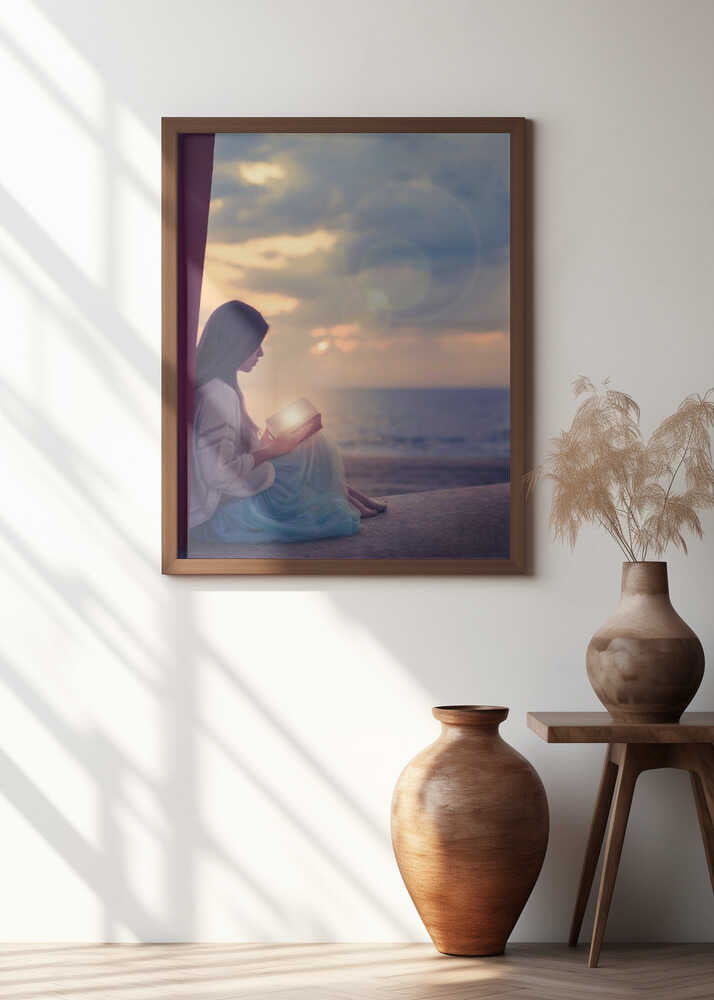 Woman sitting on a beach with illuminated book