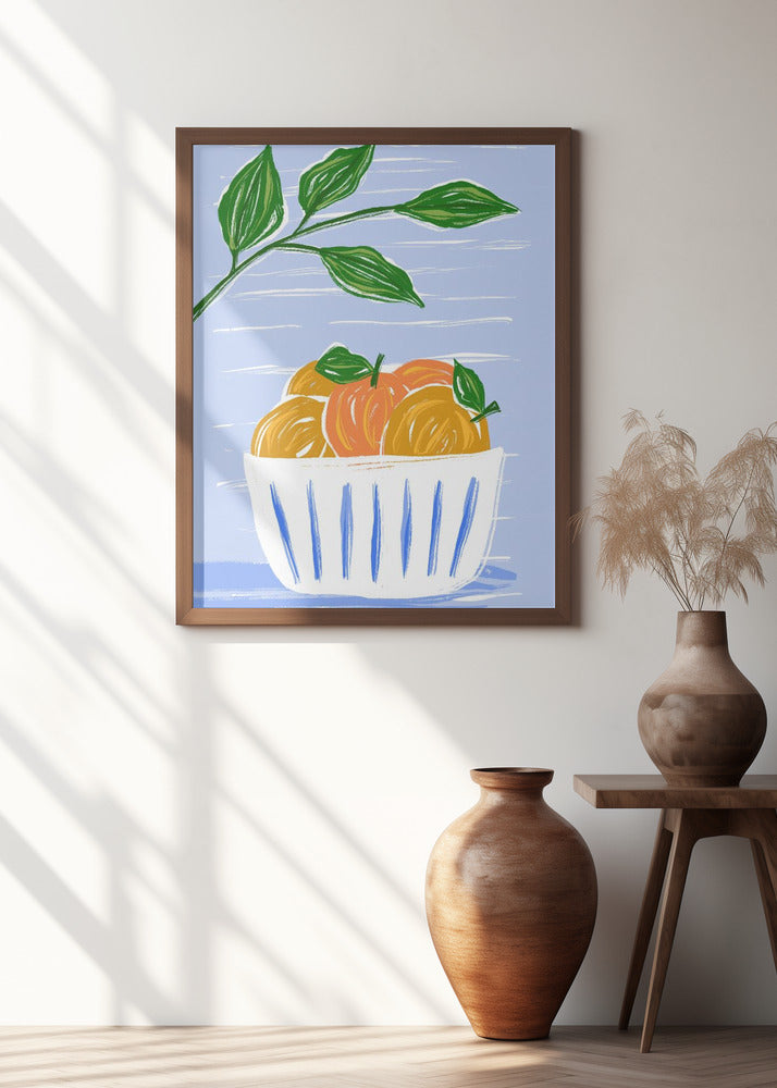 Oranges And Leaves In A White Bowl
