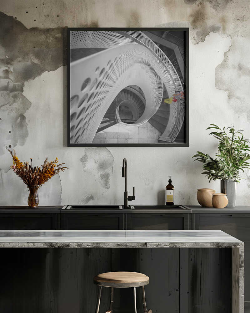 Woman descending the spiral staircase