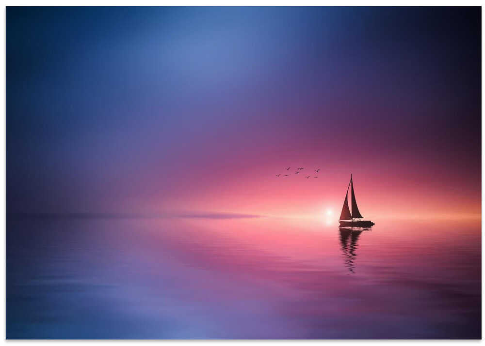 Sailing across the lake toward the sunset