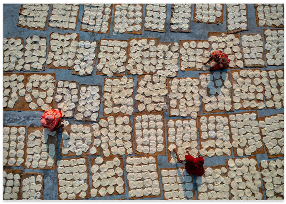 Women drying vermicelli