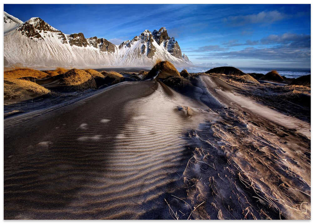 Frosted dunes and shattered peaks