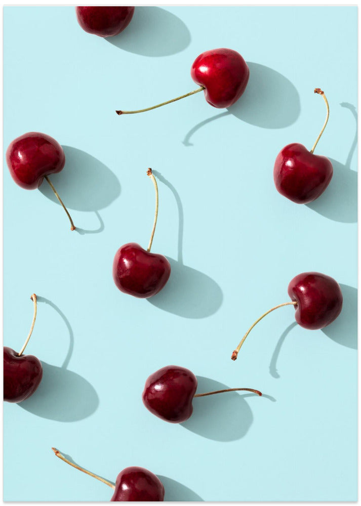 Cherries on turquoise background