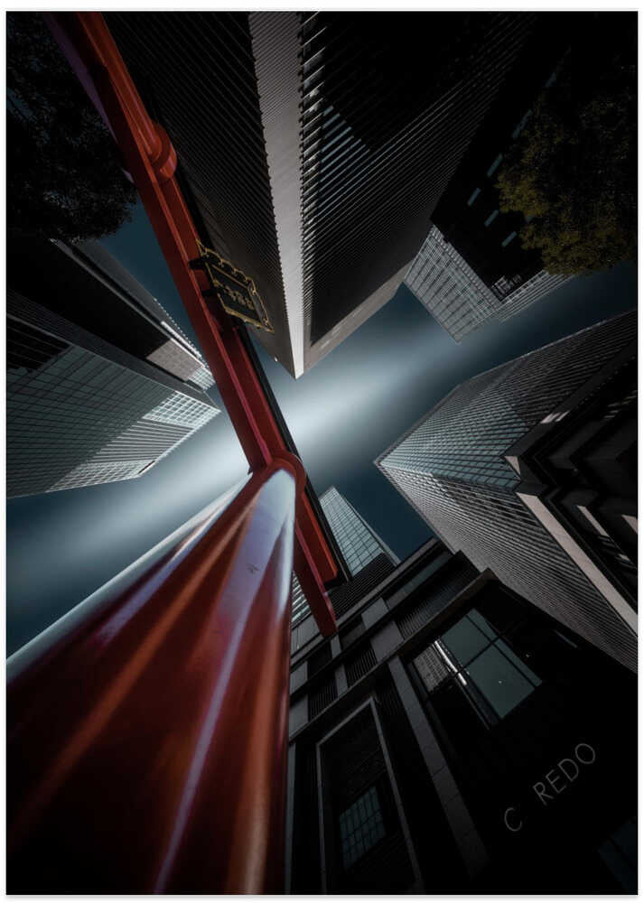 Torii gate flanked by buildings