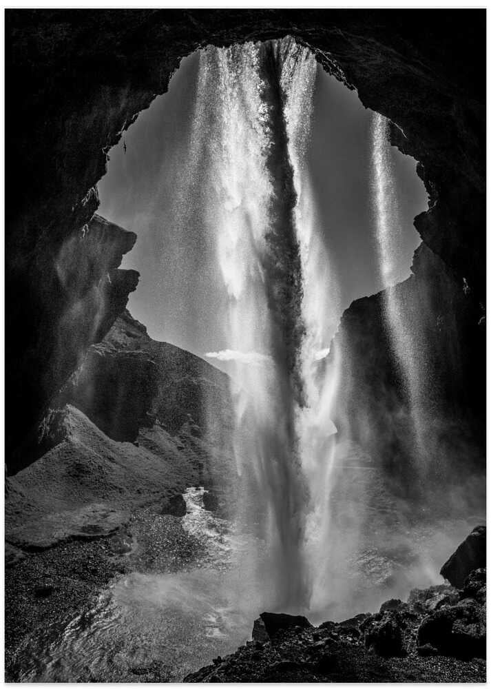behind the waterfall