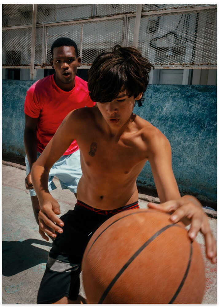 Boys playing Basketball