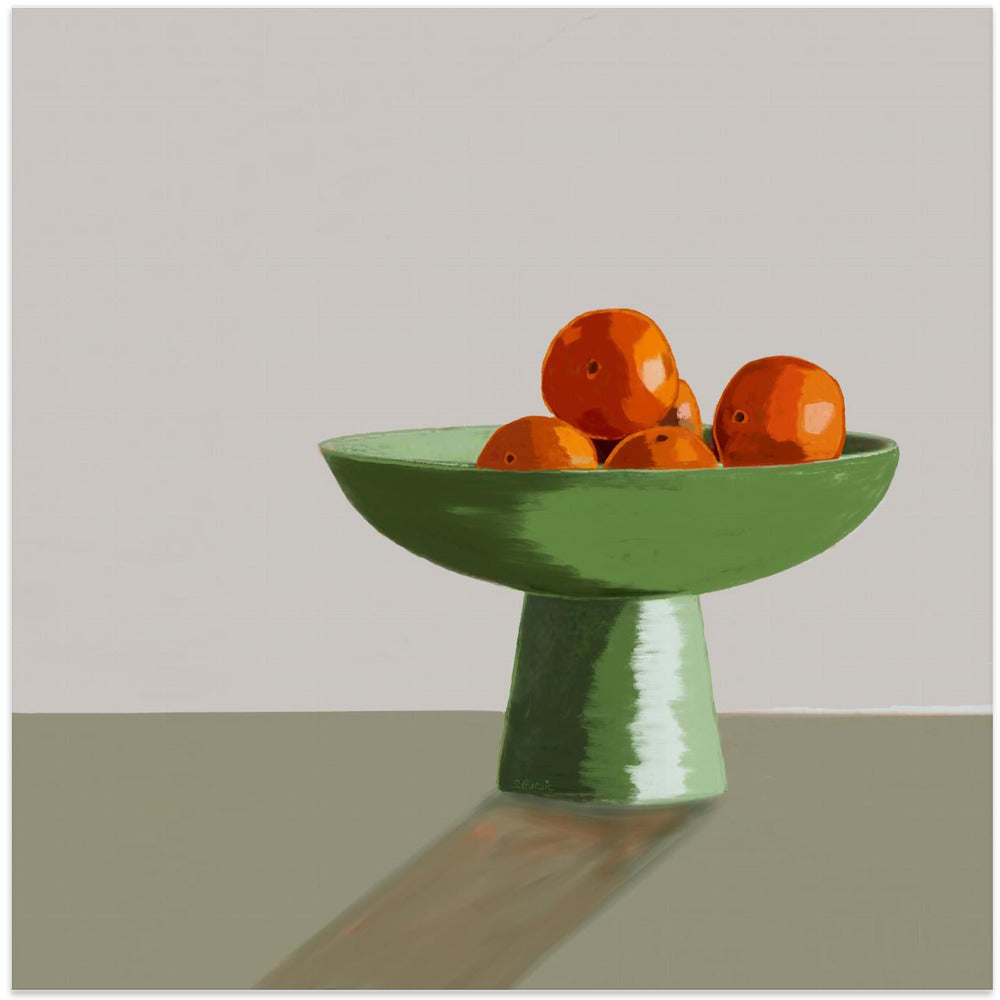 Mandarins in green bowl.