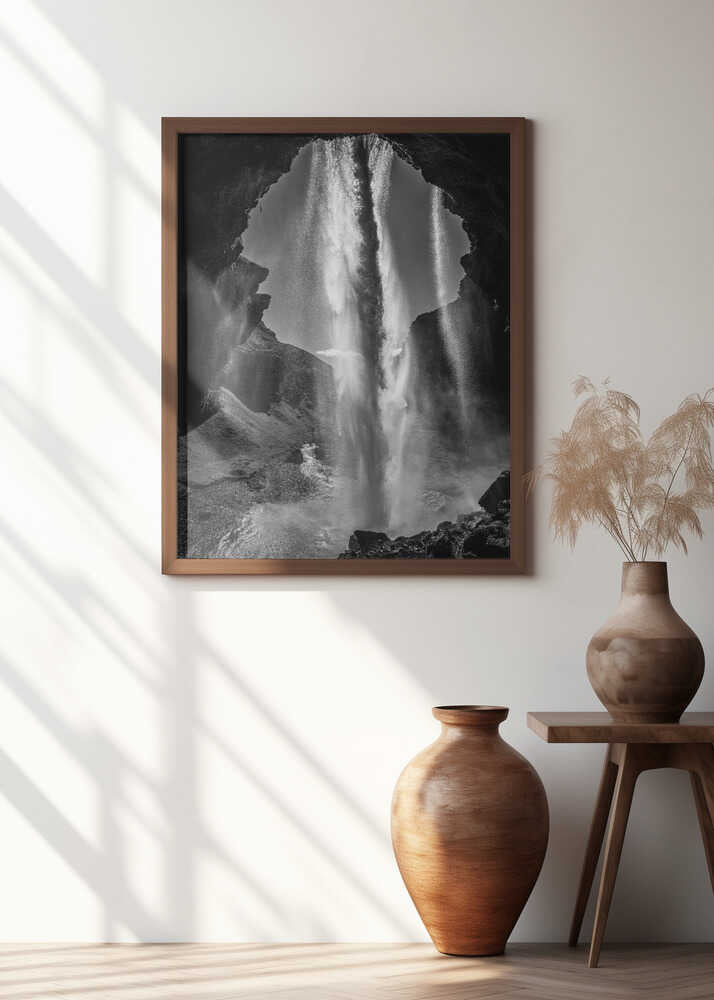 behind the waterfall