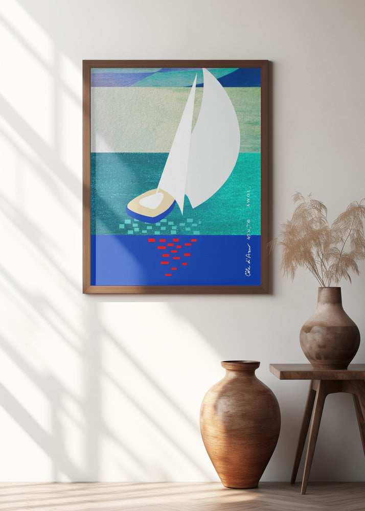 White Sailboat On The French Riviera With Reflections On The Sea