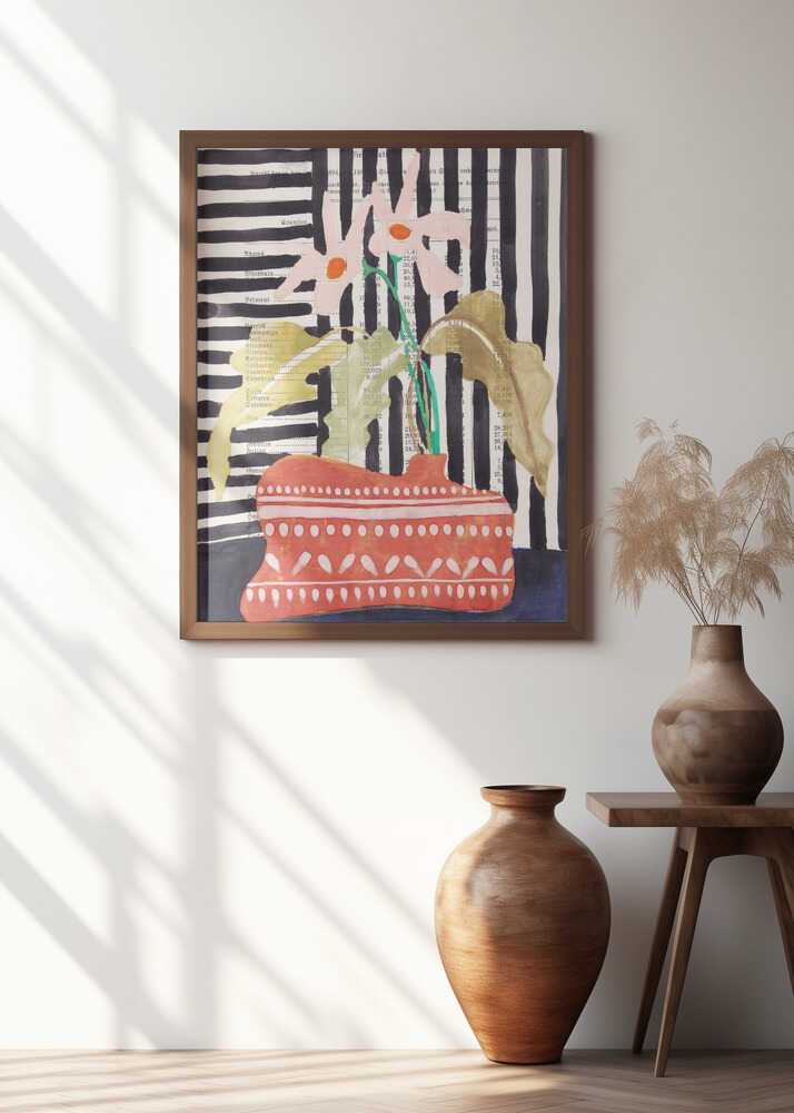 Delicate flowers in a hand-potted vase