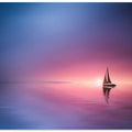 Sailing across the lake toward the sunset