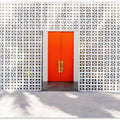 Art Prints of Parker Orange Doors and Breezeblock Wall