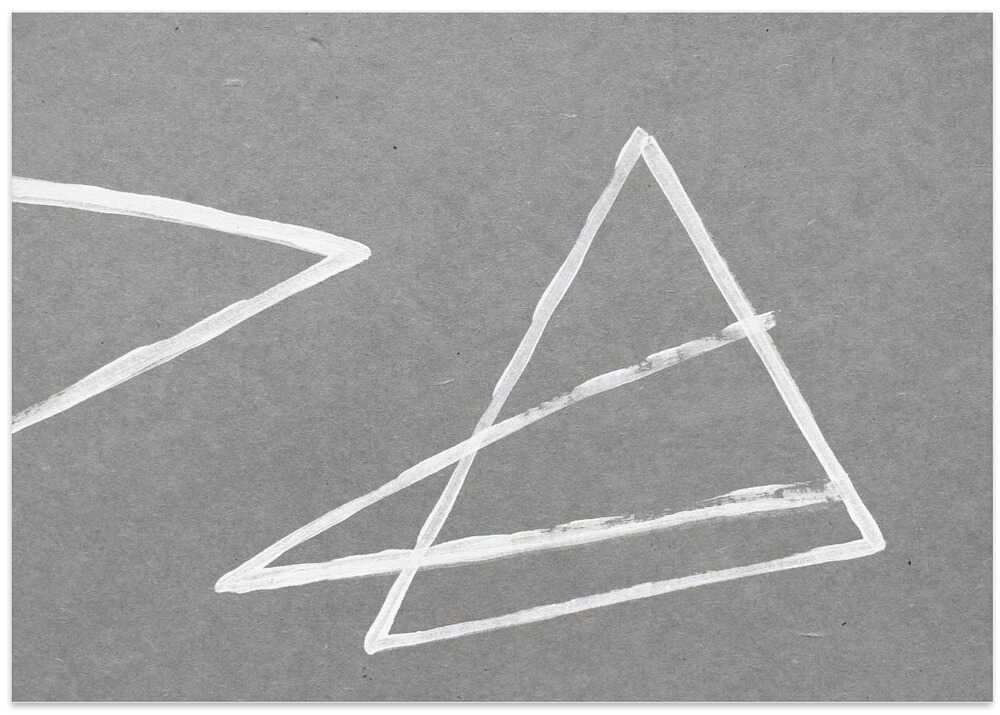 Geometric Triangles On A Gray Background