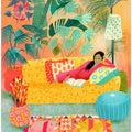 Woman Reading In Tropical Living Room