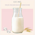 Organic Free Range Milk in a Clear Bottle with Straw