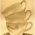Three Stacked Cups On Textured Paper