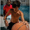 Boys playing Basketball