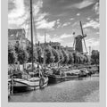 Classic Sailing Boats And A Traditional Windmill