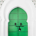 Green Door And A White Wall In Morocco
